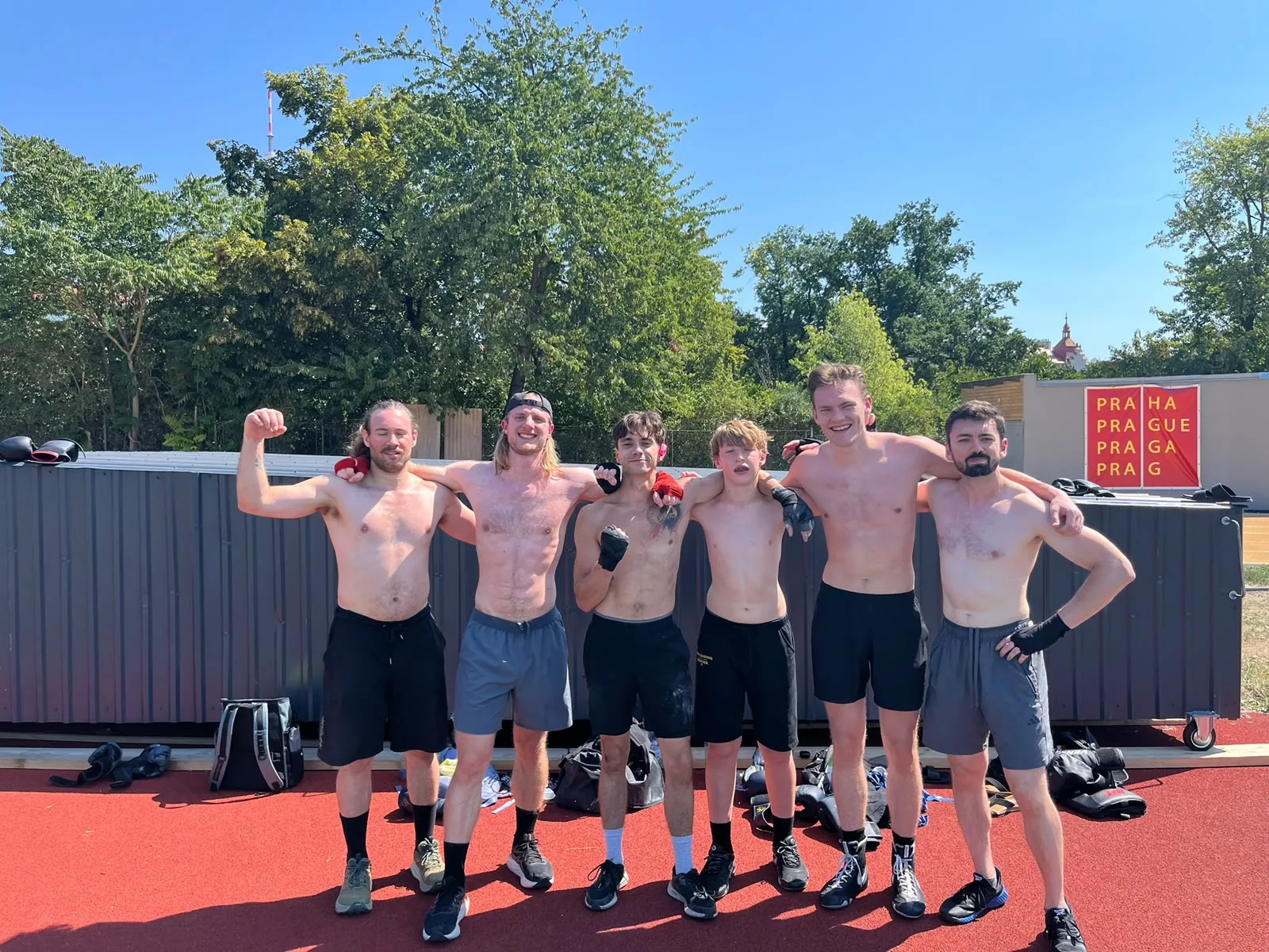 Max’s boxing group together after an outdoor session in Prague